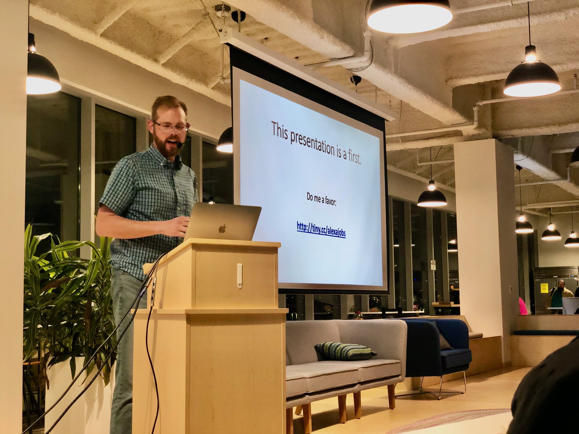 Speaker with UJUG logo